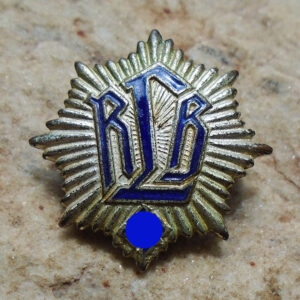 NW5079 – Badge de Membro do Reichsluftschutzbund (RLB), 1° Modelo – “Hermann Aurich”